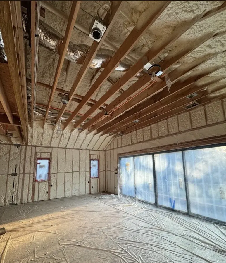 Interior walls and ceiling insulated with spray foam during new construction in Baker