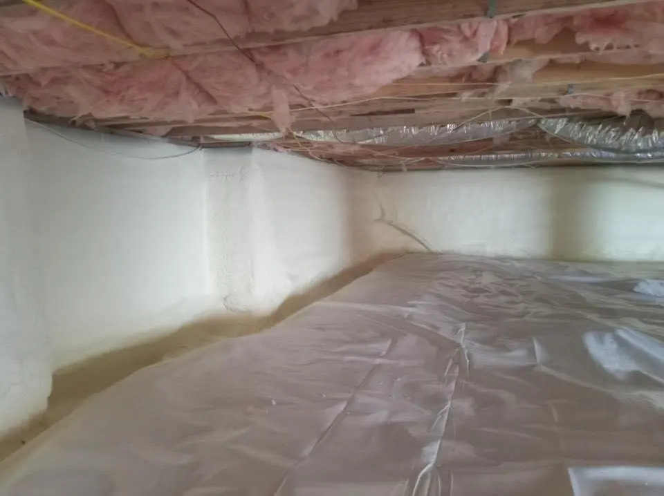 Crawl space encapsulation with closed-cell spray foam for Commercial Roof Restoration in Baker